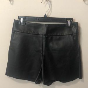 Black faux leather shorts